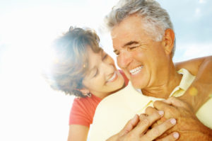 happy woman and man embracing