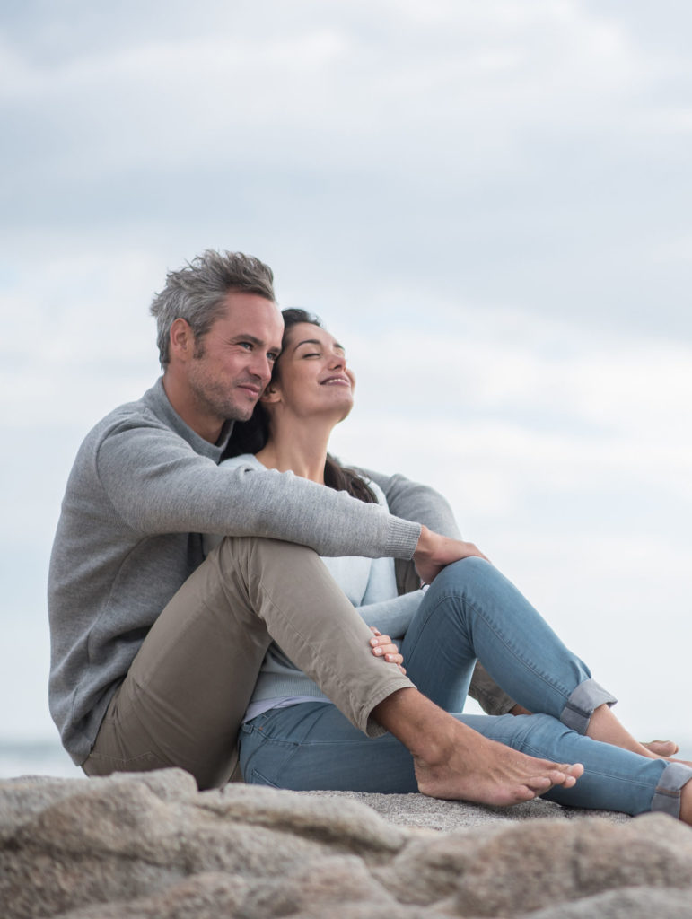 Man and woman on rock