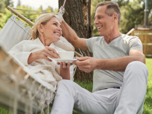 happy couple with hammock