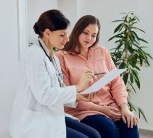 doctor reviewing weight loss program with patient