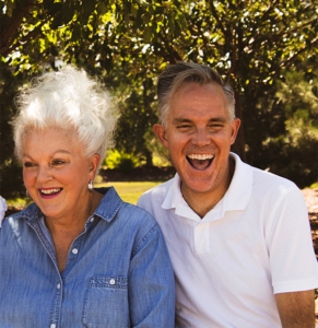 happy midlife couple outdoors